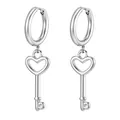 Close-up of silver hoop earrings featuring hollow heart-shaped key charms with sleek finish - Silver Key And Heart Style