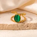 Detail of gold-plated open ring with green cat eye stone and dual-line bead texture - Emerald Green (R0825)