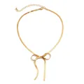 Elegante collana a maglia piatta dorata con ciondolo a fiocco e nappe pendenti raffinate - Collana a Fiocco / Oro