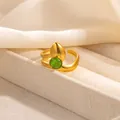 Detailed close-up of a gold double-layer open ring with green cat eye stone and metal bead - Double Band Wrap Green Cat Eye Style (R1212)