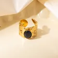 Close-up of vintage gold leaf hollow ring with a black gemstone center detail - Leaf Texture Black Natural Stone Adjustable Style (TYR1497)