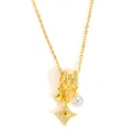 Detail of gold necklace featuring star pendants with zircon inlay and a round white pearl - Four-pointed Star Zirconia Pearl / Gold