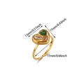 Macro detail of 18K gold heart ring showing green, pink and clear zircon stones - Heart-Shaped Zirconia Three-Color Gem Style (G1278467-S) / Gold