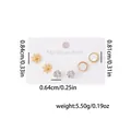 Lot de trois paires de boucles d'oreilles en acier titane doré avec fleurs et cristaux - Clous d'oreilles en acier titane fleurs 0949