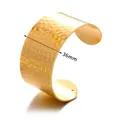 Macro shot of 36mm wide gold cuff bracelet featuring a textured hammered metal surface - 36mm Width / Gold-36mm(B1587G)