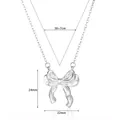 Detailliertes Maßlayout mit 38+7cm Kettenlänge und 24x22mm Schleifenanhänger-Größe - Platinfarbe (N06934)