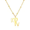 Detail of polished gold letter R pendant with cutout butterfly on a beaded chain necklace - Letter R Style
