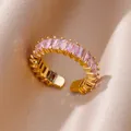 Detailed close-up of pink baguette-cut crystals on an adjustable 18K gold plated ring - Pave Baguette Pink Style (JZ4470G-7)