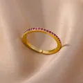 18K gold-plated open ring with purple pavé zircon accents in a stylish pavé setting - Gold Band With Purple Zirconia Style (JZ4042G-5)