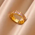 Elegance 18K gold plated ring with square pink zircon stones on champagne satin fabric - Baguette Pink Row Zirconia Style (JZ6068G-2)