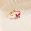 Adjustable golden stainless steel butterfly ring featuring pink zircon crystal stones - Pink Butterfly Style (1668)