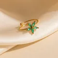 Elegant gold titanium steel ring with green petal-shaped zircon and adjustable band - Green Flower Style (1642)