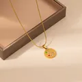 Golden zodiac necklace with engraved constellation pendant and sparkling zircon stones - Aquarius