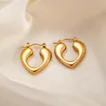 Elegant gold heart-shaped hoop earrings with polished finish and secure buckle closure - Heart Earrings 0171