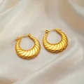Golden titanium steel twist hoop earrings with croissant textured ribbed finish - Twist Hoop Earrings 0182
