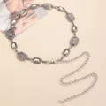 Detail of vintage silver metal waist chain with embossed geometric texture and clasp - Antique Silver Oval Hollow Relief (3815)