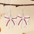 Detail view of acrylic bow earrings featuring classic red baseball stitching pattern - White and Red Baseball Style