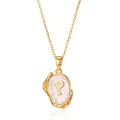 Detailed macro view of 18K gold plated letter P pendant with white enamel finish - Gold P