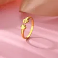 Cute golden cat paw open ring with adjustable design on a soft pink background - Gold Cat Paw Style (G1027358)