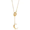 Detailed view of the gold sun and crescent moon charms on a delicate cross chain - Gold Sun Moon Celestial Y Necklace (N05650)