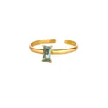 Detail of gold-plated adjustable ring featuring a rectangular light green gemstone - Adjustable Open / December