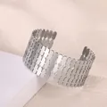 Bracciale rigido aperto in acciaio inossidabile argento con design geometrico a strati - Geometrico Ovale Cavo (P10302209)