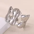 Detailed view of silver bow-shaped open bangle featuring polished metallic finish - Bow-knot Style (P10302206) / Silver