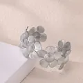Detailed macro view of matte silver daisy flower cuff bracelet with intricate petal texture - Daisy Style (P10302198) / Silver