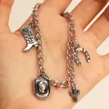 Details des Vintage-Silberarmbands mit Western-Cowboystiefel-, Hut- und Kaktusanhänger - Western-Element Charm-Armband (5352) / Antiksilber