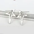 Minimalist silver star stud earrings with asymmetric cutout design in polished finish - Silver Polished Hollow Star Stud Earrings (9254)