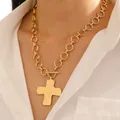 Gold chunky chain necklace with cross pendant and OT toggle clasp on model - Chunky Gold Chain Cross Necklace (KC Gold WG-1337)
