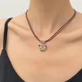 Punk Y2K leather wrap necklace featuring a gold butterfly pendant with blue enamel - Vintage Enamel Butterfly (K-1534)