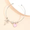 Silbernes Armband mit rosa Herz und Sternanhänger auf süßem rosa Hintergrund - Legierung Weißgold Herz Stern Schleife Armreif (DZ-1057)