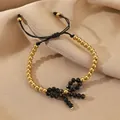 Verstellbares schwarzes Kordelarmband mit Goldperlen und 3D-Schleifenanhänger - Goldene Perlen Schwarze Facettierte Schleife Verstellbares Armband (N-1112)