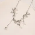 Silver bow necklace with white faux pearl pendants in a French vintage aesthetic - Silver Bow Pearl Tassel Long Necklace (N-1087) / Silver/White