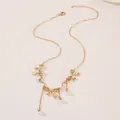 Elegant gold bow necklace with white pearl pendants and adjustable lobster clasp chain - Gold Bow Pearl Tassel Necklace (DZ-921) / Gold/White