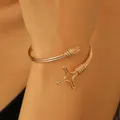 Chic gold-plated open cuff bracelet with spiral detail and star clasp for women - Gold Star Wire Wrapped (6386)