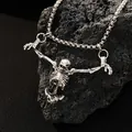 Gothic punk skeleton pendant necklace with silver chain on black volcanic rock texture - Antique Silver Skull Pendant (A-1373)