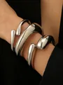 Polished silver layered cuff bracelet with irregular sculptural hollow design for women - Multi-Layer Sculptural Wide Bangle Three-Piece Set / Silver