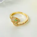 Bague serpent dorée ornée de cristaux blancs scintillants et d'yeux en gemme verte - Or KC Moyen