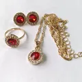 Elegant gold-plated jewelry set featuring red round crystals and white stone accents - Round Red Halo Gemstone Set (02 KC Gold Red A-874)