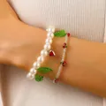 Elegant pearl bracelet set with green leaf charms and cherry beaded jewelry for women - Cherry Leaf Artificial Pearl Style / Red Cherry (8033)