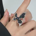 Dark aesthetic asymmetrical black butterfly ring with fluid silver metallic lava texture - Gothic Butterfly Ring (K9429)