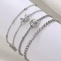 Silver 4-piece bracelet set featuring butterfly charm, textured beads and pavé crystals - Silver (6311)
