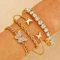 Golden 4-piece bracelet set featuring crystal tennis chain and butterfly charms - Gold (2031)