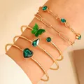 Five-piece gold bracelet set featuring emerald green gemstones in heart and butterfly shapes - Gold (2434)