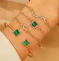 Golden alloy 4-piece bracelet set with emerald green stones and sparkly rhinestones - Gold (3114)