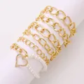 Set of 6 gold alloy bracelets with textured chains and white faux pearl heart charm - Gold (0541)