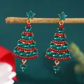Golden Christmas tree earrings featuring green heart gems and red crystal accents - Green Heart Gem Christmas Tree (DZ-078) / Gold