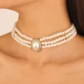 Vintage three-layer pearl choker necklace featuring a central oval pearl with rhinestone halo - Gold Triple Layer Pearl Jewelry Necklace (11985)